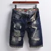 Patch strappato jeans short maschi estate sfilacciate piste in denim da cinque centesimi in stile britannico tendenza di alta qualità jeans 240403