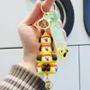 Q Version périphérique BT21 Groupe de balles Bulletproof Group Doll Keychain Pendant Cartoon Car Cavyring pliing Music Pendant petit cadeau