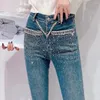 Jeans pour femmes lourdes perles de l'industrie haute échange 2024 vêtements d'automne slim fit pantalon de bootcut élégant long y2k