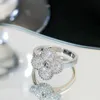Designer merk van versie vier bladgrasring dames 18k goud vergulde volledige diamant gelukkige paar lichte luxe mode
