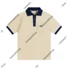 MEN MENSER TEE Polo قمصان فاخرة مزدوجة رسالة طباعة قصيرة الأكمام polos tshirts الصيف نساء من طوق الترفيه tshirt tshirt tshirt أسود أبيض أزرق xs-l