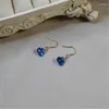 Boucles d'oreilles en pente