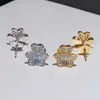 Marque de créateurs Golden Van trifolium épaissis des boucles d'oreilles à anneaux d'or à 18 carats pleins de diamant chanceux