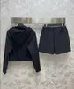 24 dames korte mouwen kap -jas shirt elastische taille shorts klassieke nylon stof rits set 331