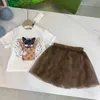 Girls Fluffy Galze Princess Skirt 2024 Nova garotinha elegante de camiseta curta de mangas curtas saia de malha