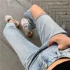 Jean pour femmes hautes taille déchirée pour un pantalon en jean mince lâche 2024 pantalon déchiré de femmes vintage streetwear