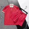 Męskie dresy mody Summer T koszule + szorty Zestawy odzieży z literami Casual Streetwear Trend Suits Mężczyźni oddychające TEE PANTY 4 kolory