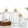 Lagringsflaskor Transparent 30 ml 50 ml 100 ml Flat Square Cosmetic Serum Essential Oil Glass Droper Bottle With Bamboo Cap 15 ml