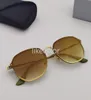 Modieuze zeshoekige drijvende lens zonnebril metalen frame arista gouden uiterlijk en matching met koper zilverblauw of GO8192056