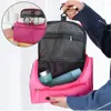 Bolsas de cosméticos Negócios Bolsa de maquiagem portátil Bolsa de maquiagem Organizador Mulheres viagens impressas em bolsa impermeável pendurada