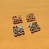 Luo Familys French style full diamond earrings are meticulously carved with heavy craftsmanship and the highendf eelingi si nlaidw ithd iamondsTh ege ometricho llo