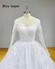 Hyr Lnyer Scalloped Neck -knappar uppåt tillbaka långärmad paljetter Applikationer Princess Ball Gown Wedding Dresses Real Office Photos Video Video