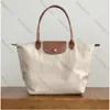 Bolsa de bolsa de designer longa de alta qualidade feminino bolsas de ombro de bolsas crossbody shopping praia famosa the Totes ombros mulheres mulheres