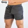 Men entrenamiento de gimnasio pantalones cortos de entrenamiento deportes ropa casual de ropa pantalones cortos de pantalones cortos machos bañadores de natación pantalones cortos 240412