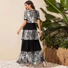 Robes de fête Design Summer Bohemian Clothing Fashion Women Imprimez V-Col Cake Robe America Europe Femme Robe Casual Vestido de Mujer