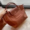 Luxury Designer Bag Ladies Bag Casual Bag Curble Bag de hombro de alta capacidad Mujeres Diseñadores de bolsos Bag Black Crossbody CHAMMP Moda de compras para mujeres