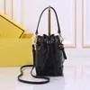 Mon Tresor الكتف مصمم حقيبة Sheepeskin Mini Bucket حقيبة Crossbody حقيبة يد سوداء مناسبة أي مناسبة دلو الرباط