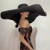Sommar 70 cm Stora breda grimsolhattar för kvinnor överdimensionerad strandhatt vikbar rese halm hatt lady uv skydd sol skugga hatt 240412