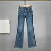 Calça de jeans feminino calça de jeans de canto de sino de sino 2024 Cantura elástica de outono Figura solta Figura lisonjeira esfrega