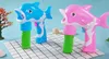 Онлайн -знаменитость Полностью автоматическая пузырька, выдуваемая вода Электрическая пузырька, выдуваемая машина детская игрушка Dolphin Пулемет 240408