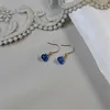 Boucles d'oreilles en pente