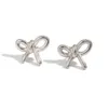 2024 Sweet mignon Boucles d'oreilles à bowknot en argent en argent en acier inoxydable boucles d'oreilles en acier en acier inoxydable bijoux pour femmes filles