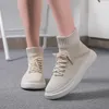 Casual skor sommar kvinnor stretch sock mode andas anda student korta stövlar sneakers glider på lägenheter för par femme tenis