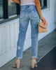 Jeans femminile 2024 con buchi e sottili pantaloni a nove punti dritta lavaggio casual