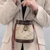 Handbag Designer 50% Discus sur les sacs féminines de marque chaude nouvelle cordon de cordon un sac de seau d'épaule