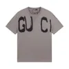 하이 버전 패션 GU 가족 공동 작업 B 가족 퍼지 문자 인쇄 남성과 여성의 느슨한 짧은 슬리브 티셔츠 탑