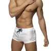 Mens Swimming Trunks Classic Solid Color Three Point Snabbtorkning Låg midja Sexig strand surfing Sportshorts 240412