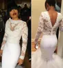 2020 Modest White African Prom Dresses Mermaid Illusion Lace Appliques V Back Puffy kjol Black Girl Formal Dress Long Sleeves Pro9229567