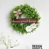 Decoratieve bloemen Deur Decor Leer Kerstmiskrans met lichten Batterij bediende buitenkransen voor voorgarage