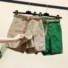 Kvinnor bantning shorts hög midja kvinnokjol med sidodelade fickor över knälängd fast färg för kvinna 240403