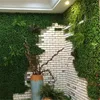 Flores decorativas 25 Plantas verdes artificiais de grama de alta qualidade Plantas de cenário para a decoração de construção de empresas domésticas