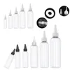 Bouteilles de rangement 30pcs 10 ml / 20 ml / 30 ml / 50 ml / 100 ml Mini colle en plastique vide avec les couvercles à vide à l'huile liquide d'huile de liquide pressée