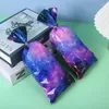 Partydekoration 10-50pcs Galaxy Geschenktüten behandeln Außenraum Plastik-Süßigkeiten mit Twist Bindes Kinder Geburtstag Babyparty