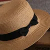 Basker sommarhattar för kvinnor sol hatt strand damer mode platt brom bowknot panama lady casual halm