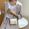 Tas 2024 Mini Mini Dames Crossbody Fashion Messenger Casual Flap Magnetic Buckle massief stenen patroon schoudertassen