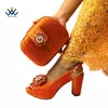 Kledingschoenen modieuze Italiaanse vrouwen bijpassende tas in oranje kleur volwassen Afrikaanse dames comfortabele hakken sandalen voor feest