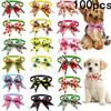 Ropa para perros 50/100pcs accesorios pequeños de verano arco arco de los arcos de cabello para perros para perros