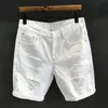 Летняя мужская мода белая дыра для мытья джинсовая шорты.
