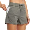 Cordon de yoga short poche haute taille de couleur solide