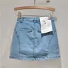 Jupes à la mode mini jupe 3d grand denim de fleur court pour femmes printemps été 2024 enveloppe de hanche en vrac noir