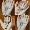 Brangle de style antique chinois imitation Jade Lotus Bracelet Hanfu Accessoires Conseil de bambou haut de gamme