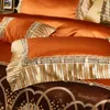 Conjuntos de ropa de cama Bordado de alta gama conjunto de cuatro piezas Cubierta de colcha de satén de encaje de lujo COPORTOR DE OCHO PIRE