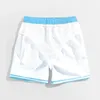 Shorts pour hommes Summer des vêtements actifs plage élégante avec une couleur à contraste dégradé