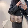 Bag Ladies Sexy Snake Pattern Baguette Texture Chain Spalla Spring Bags Bags Women Fashion Trend Crossbody