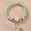 Länkarmband utsökta vitt blomma glas pärlor kvinnors armband fashionabla elegant guldfärgkedja sommar för tennissmycken