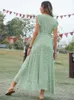 Robes de fête Houzhou Robe de floral élégant sexy Femmes Summer Bohemian Holiday Long Green Irrégulet Casual Bandage Loose Sundage